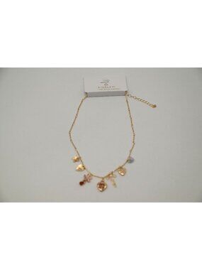 NWT Josslyn Gold Tone Multi Charm Necklace Heart Flower Bow Pendant Feminine